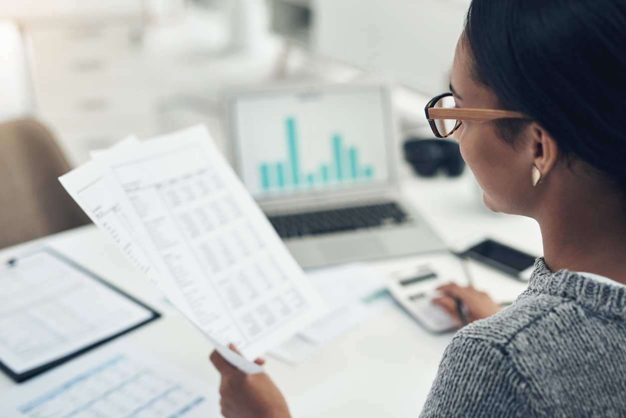 Women calculating papers